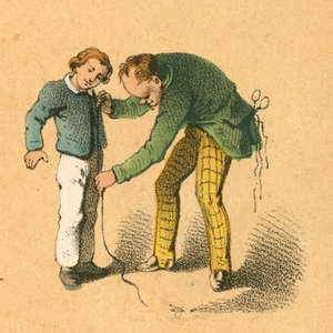 A fiút a szabója méri alkotó: English School