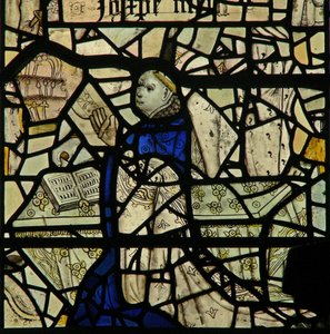 W46-os ablak, amely adományozó papot ábrázol alkotó: English School