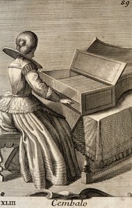 Woman playing the harpsichord
