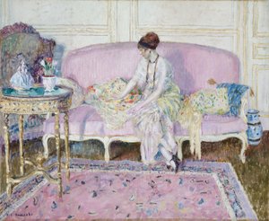 Nő ül a kanapén a belső térben alkotó: Frederick Carl Frieseke