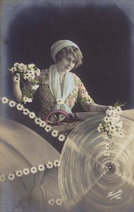 Egy fiatal nő, aki sok virágot tart, és egy gyárban dolgozik (színezett fotókollázs) alkotó: French Photographer