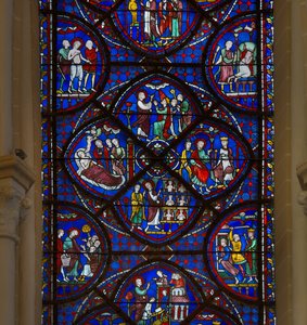 A Chartres székesegyház ólomüvege: részlet Szent Tamás életéből alkotó: French School