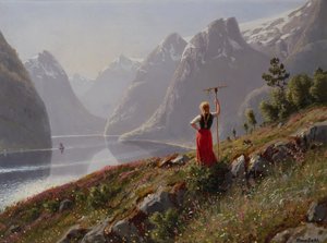 Lány egy gereblyével a fjord tájban