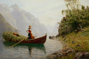 Nő és férfi a fjord tájban
