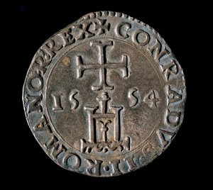 A Gének Köztársaság pénzneme: a Benediction ezüst testonja (vagy testone). Elöl, amely a genovai portált ábrázolja egy kereszt alatt. 1554 Genes, Musei di Strada Nuova alkotó: Italian School