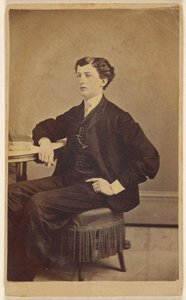 [Azonosítatlan fiatalember ül egy asztalnál] alkotó: James S. Woodley