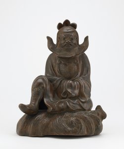 Shoki figurája, a démon fojtogató sziklán ülve, Imbe, Okayama prefektúra, Edo korszak vagy Meiji korszak (kerámia) alkotó: Japanese School