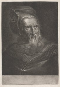 Férfi kalapot visel