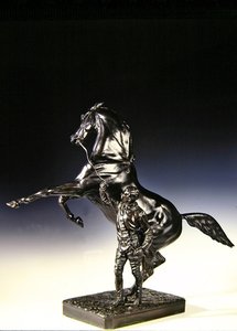 A nevelő telivér és a lovász (bronz)