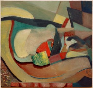 Dombormű piros lábbal alkotó: Kurt Schwitters