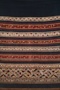 Összetett bűn embere, Hua Phan, Laosz (textil)