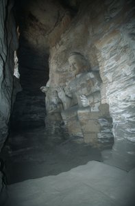 China, Shanxi province, sandstone statue of Buddha in Yungang Grottoes alkotó: Unbekannt Unbekannt