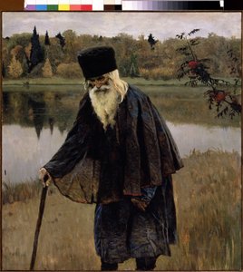 Egy remete (A Remete). Egy szakállas, fehér hajú öregember sétál a botja fölé hajolva a tó partján. Mihail Vasziljevics Neszterov (1862-1942) festménye, olaj, vászon
