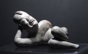 Fekvő Olmec baba-arc figura, Villa Nueva