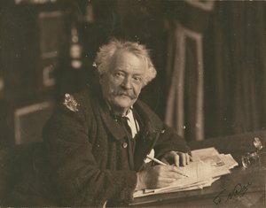 [Félix Nadar az íróasztalnál ül]