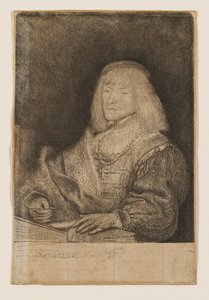 Férfi az íróasztalnál, keresztet és láncot visel alkotó: Rembrandt van Rijn