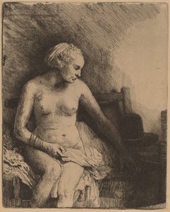 Nő a fürdőben kalappal mellette alkotó: Rembrandt van Rijn