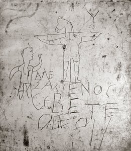 Káromló graffito egy keresztre feszítésről (kő)