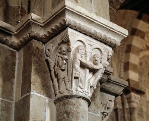 Ézsau visszatér a vadászatból, és apja, Izsák előtt találja magát, aki megáldja Jákóbot (faragott tőke) alkotó: Romanesque