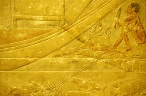 Ókori Egyiptom, Falfaragás/festés, Mastaba/Idout sírja, Szakkara, i.e. 2323-2150, Halat pikkelyező halász, aki négyágú lándzsát tart (fotó) alkotó: School Egyptian
