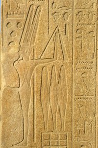 Ókori Egyiptom, falfestmény/faragás, Min isten, Karnaki templom, Luxor, termékenység istene, cséphadarót tartva (fotó) alkotó: School Egyptian