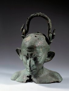 Bronz fej alakú váza: szír rabszolga (?) mellszobra. 2. vagy 3. század a JC után. V 0,19 m Párizs, Musee du Louvre