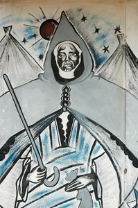 Falfestmény, amely egy muszlim spirituális vezetőt ábrázol, Dakar, Szenegál alkotó: Unbekannt