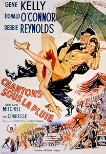 StanleyDonen és GeneKelly énekel az esőben filmplakát Gene Kellyvel és Debbie O