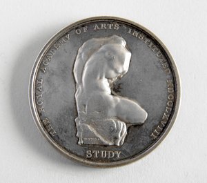 R.A. George Framptonnak ítélték oda 1884.12.10-én a legjobb figuramodellért (fém)