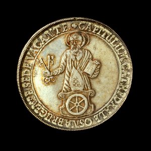 A német érme Szent Péter, a püspökség védőszentjének alakját ábrázolja alkotó: Hippolyte Lalaise Devéria