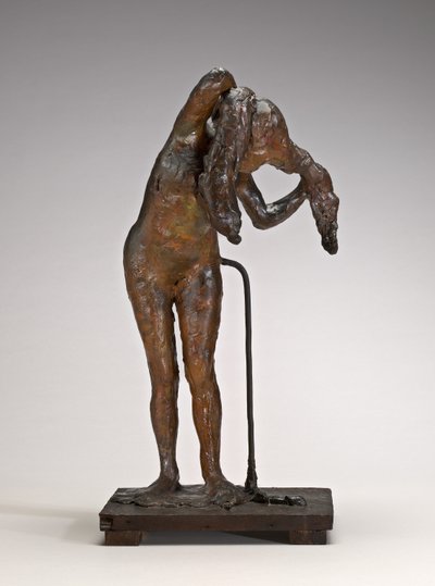 Haját rendező nő, valószínűleg az 1880-as évek végén, 1890-es években. alkotó: Edgar Degas