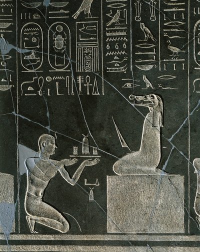 I. Nectanebo, a krokodilfejű démonnak ajándékozó király dolerite domborműve Héliopoliszból az Atum templomban alkotó: Egyptian 30th Dynasty