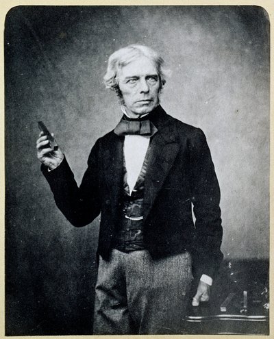 Michael Faraday (1791-1867) egy rúdmágnessel a kezében, Maull és Polyblank munkája alkotó: English Photographer