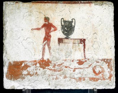 Etruszk művészet: fiatal meztelen ephebe egy asztal mellett, ahol egy vázát helyeznek el. A „búvár” sírjának freskója. Paestum déli temetőjéből. Kr.e. 480-470. Museo Archeologico Nazionale, Paestum alkotó: Etruscan