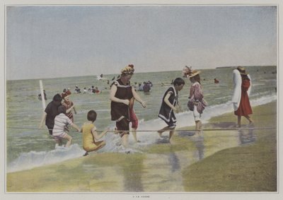 Kötéllel játszó gyerekek a strandon (színes fotó) alkotó: French Photographer