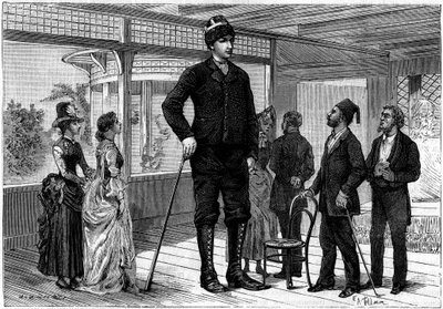 Amanab (vagy Auvassab, valódi nevén Amenates Tingitsoglu 1868-1887), egy 2,36 méteres görög óriás, aki megfordult az európai fővárosokban, aki óriást inspirált Jules Verne (1828-1905) „Egy különc akarata” című történetében. ). Metszet „” La Na alkotó: French School