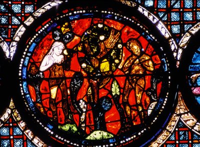 Chartres-i katedrális, festett üvegablak, amely a kör alakú irgalmas szamaritánust ábrázolja Festett üvegablak (festett üveg) alkotó: French School