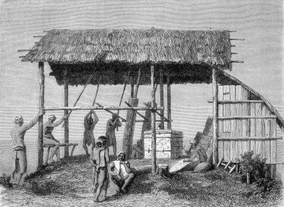 A „Le Tour du monde” 1862-es kiadásában megjelent illusztráció, amely egy kovácsot ábrázol a dayakokban Borneo szigetén. Metszés. alkotó: French School