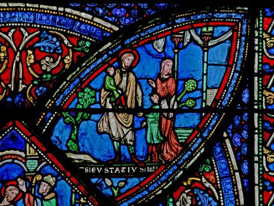 A w21-es ablak Szent Eustache életének egy jelenetét ábrázolja: családjával elhagyja otthonát alkotó: French School
