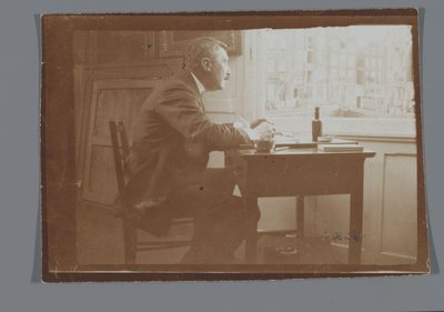 Willem Witsen az íróasztalánál a hajójában alkotó: George Hendrik Breitner