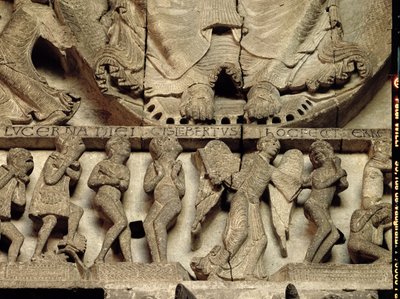 A West Portal timpanonja az Utolsó Ítéletet ábrázolja: Krisztus lábának részlete, egy angyal és halandók, 1130-35 körüli mészkő alkotó: Gislebertus