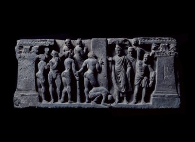 Gandhara művészete (vagy görög-buddhizmus): „” A dévadattai íjászok megtámadják Gautamat”” (Dévátta íjászai megtámadják Gautama Buddhát) A Gandhara Iskola domborműve – 2-4. század – Indiai Múzeum, Kalkutta, India alkotó: Indian School