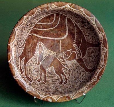 Iszlám művészet: vágja a tevét, aki szoptatja a babáját. Irakból. 10. század. Párizs, Louvre Múzeum alkotó: Islamic School