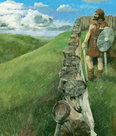 Rekonstrukciós rajz, amely egy vaskori embert ábrázol, aki egy fából készült palánkkerítés mellett áll a Liddington Castle Hillfort tetején, Swindon, Egyesült Királyság. alkotó: Ivan Lapper
