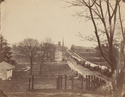 Katonai vagonok vonata belépve Petersburgba, Virginia, 1865. április. alkotó: John Reekie