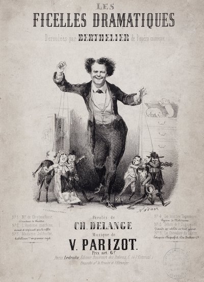 Jean Berthelier (1830-1888) portréja, aki a bábok fiait tartja kezében. Album „Les Ficelles Dramatiques, amelyet Berthelier de l’opera comique bontott ki” alkotó: Nadar