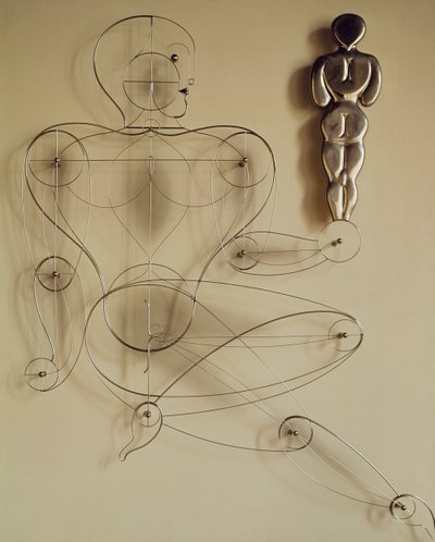 Homo, drótfigura hátulnézeti figurával a kezében alkotó: Oskar Schlemmer