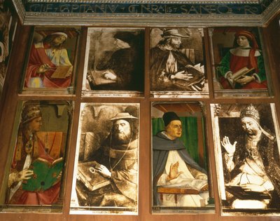 Federigo da Montefeltro, Urbino hercegének tanulmánya az óramutató járásával megegyező irányban a TL-ből: Megara Euklides, görög filozófus (Kr. e. 450-374); Vittorino da Feltre, olasz pedagógus (1378-1446); Solon, az athéni törvényhozás alkotó: P. Joos van Gent and Berruguete