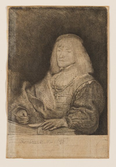 Férfi az íróasztalnál, keresztet és láncot visel alkotó: Rembrandt van Rijn