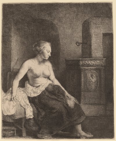 Nő félig felöltözve ül a tűzhely mellett alkotó: Rembrandt van Rijn